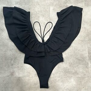 Zara ruffle fun top with attached bottom. Can be a fun top or bathing suit